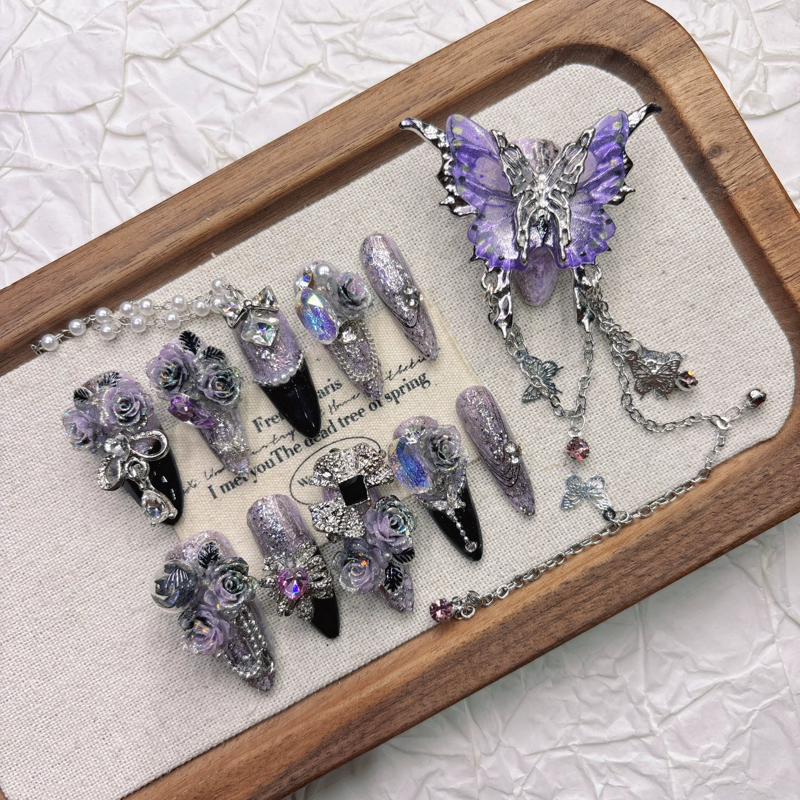 Purple tassel 11-finger large butterfly handmade nail art, heavy-duty, high-end, cool and stylish nail art for 2026 mid-length design.